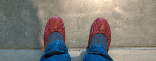 Crossing the threshold; me in my red shoes entering the Ziba lobby.