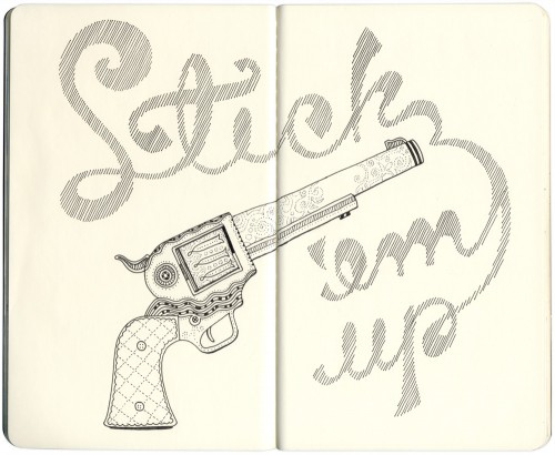 embroidered gun with shaded type