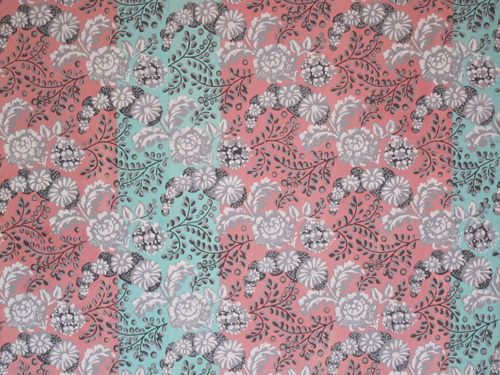 Pink and teal flowery royal wallpaper.