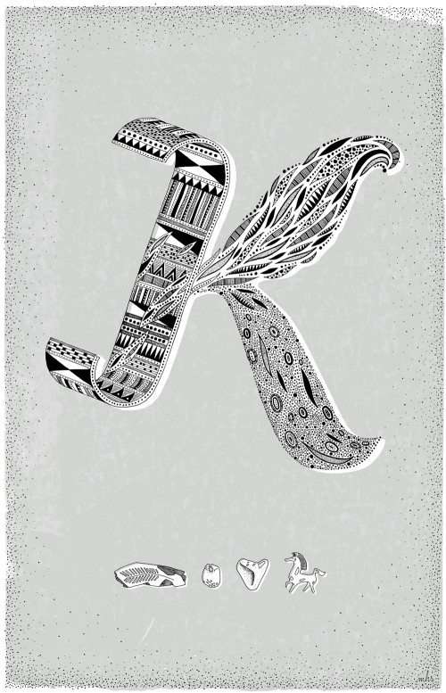 Intricate hand drawn letter K with tribal, feather and mitochondrial patterns.