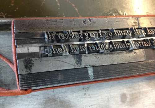 Block of metal type - the recipe for our rød grød poster.