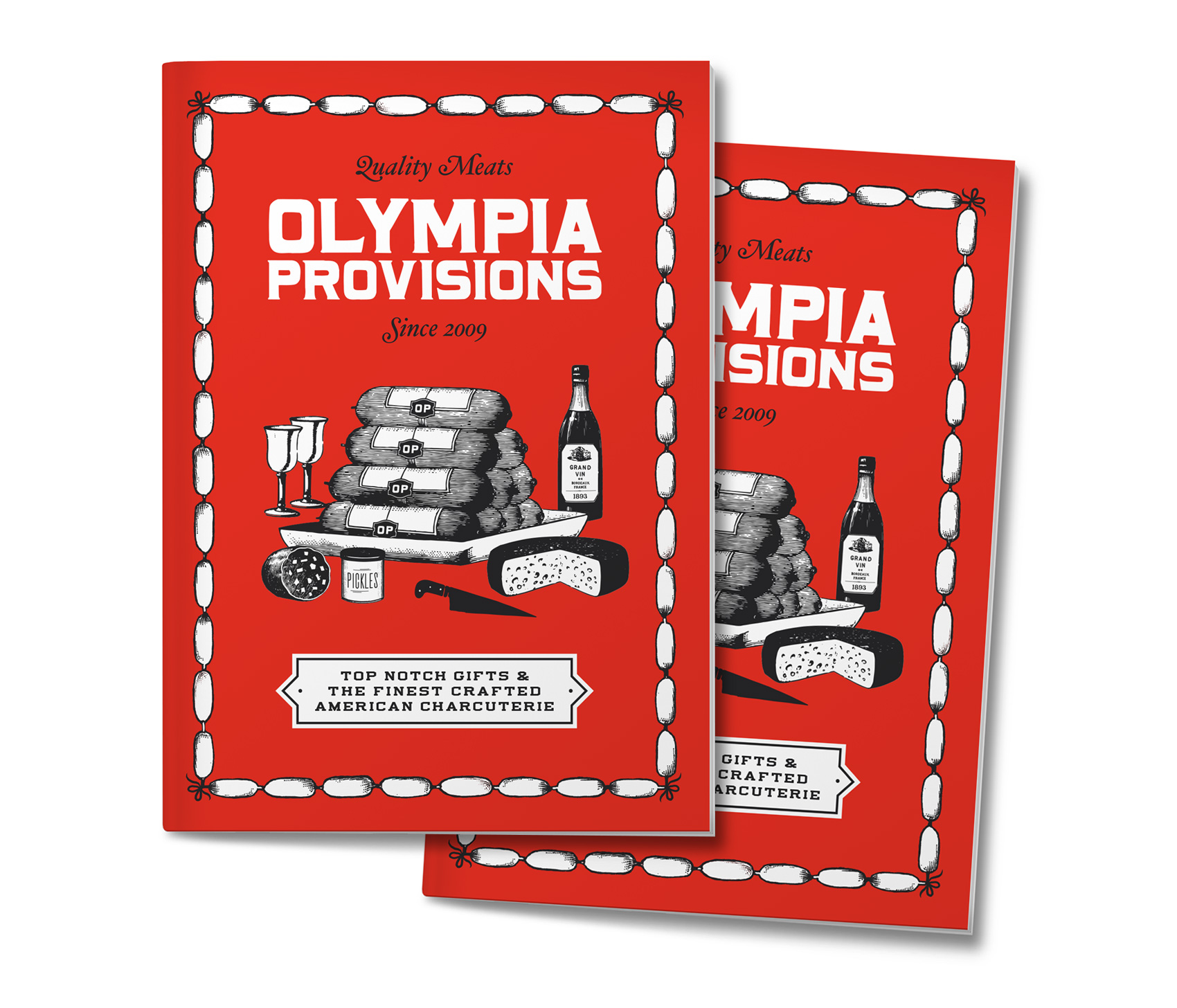 Olympia Provisions holiday catalog - a red booklet with stack of sausage on display