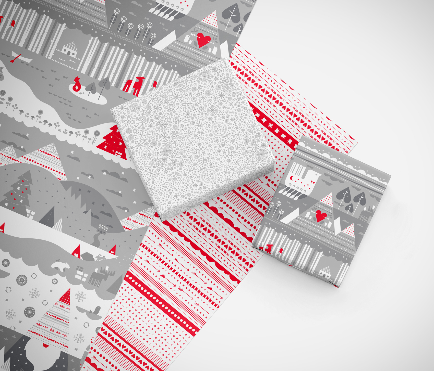 Red ribbon and silver snowflake flurry gift wrap paper patterns, along with gnome winter landscape in tonal grays.